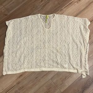 Very flattering and unique beach coverup or sheer top if you dare